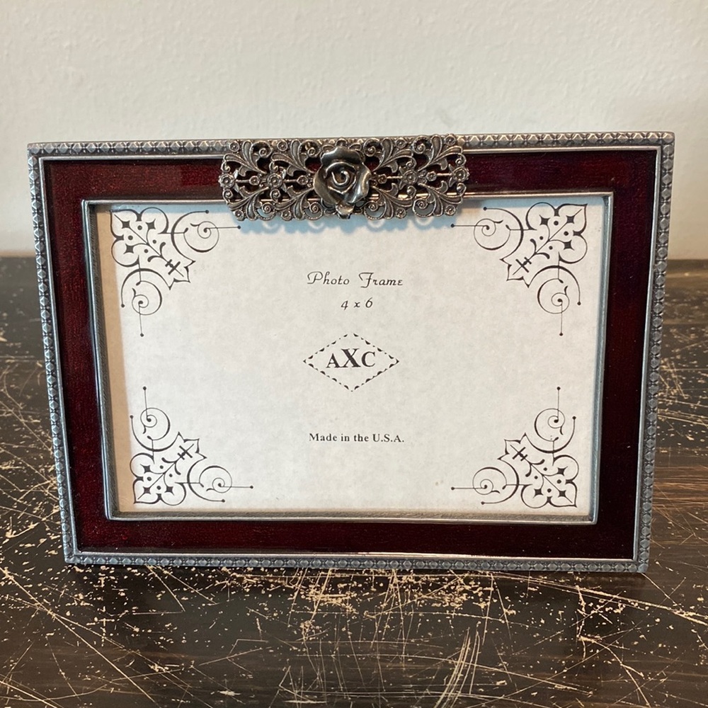 Beautiful medal and enamel picture frame.